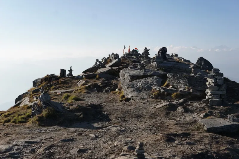 Wide-angle view from Chandrashila summit, the highest point of the Chopta Chandrashila trek. | © MountRoutes