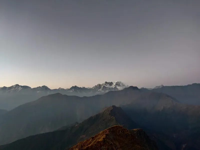 Chaukhamba and surrounding Himalayan peaks visible from Chandrashila on this iconic Uttarakhand trek. | © MountRoutes