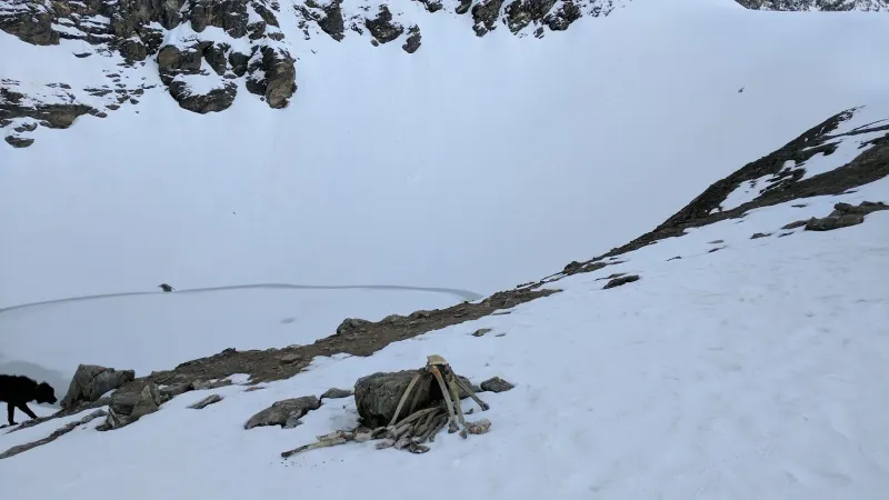 Skeletons resting beside the frozen Roopkund Lake, where mystery and mountains meet | © MountRoutes