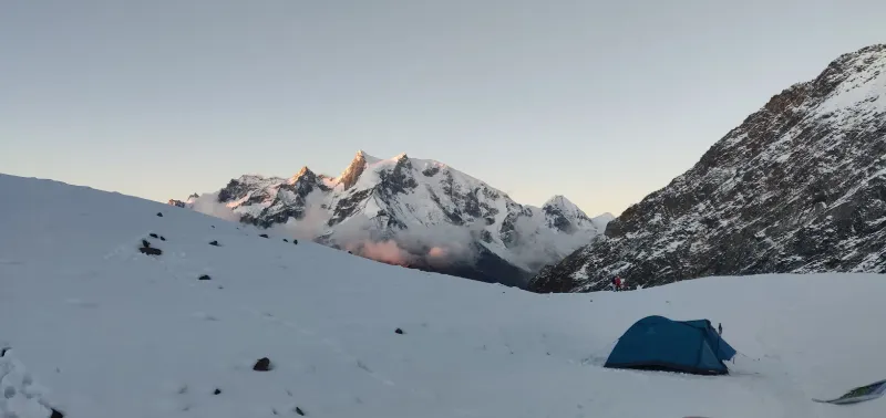 Advance Base Camp on the Bali Pass trek in September, surrounded by snowfields and towering peaks. | © MountRoutes